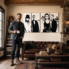 Ročno poslikana slika POP Art U2 v črni barvi 4 kosi U22 – slika v sodobnem moškem interjerju, lifestyle vizualizacija. Prevladujoče barve: črna, bela.