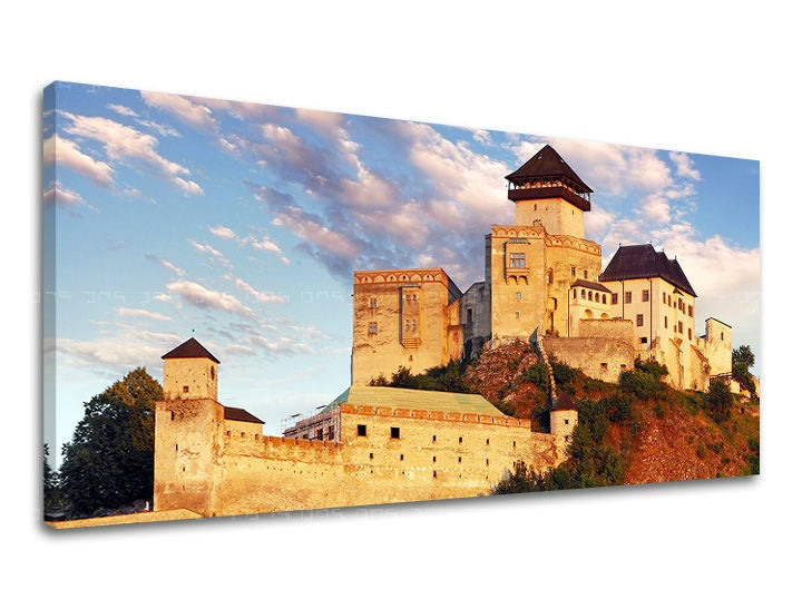 Slika na platnu z motivom starodaven grad na hribu pod modrim nebom – 3D prikaz platna z vidnim lesenim okvirjem, Papilora.